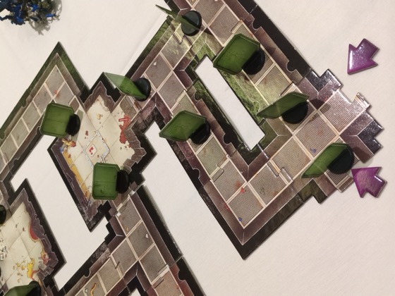 Space Hulk board in mid-game at KublaCon Prime 2026, Blood Angels and Genestealers locked in the corridors